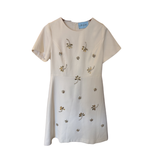 Cream dress hand-embellished with golden stones tropical